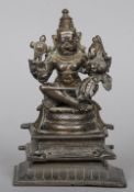 An 18th/19th century Indian bronze figure of Vishnu as Narasimha
In his benign aspect, seated