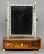 A 19th century Anglo-Indian vizagapatam ivory mounted dressing mirror
The adjustable mirror plate