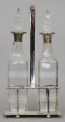 A Hukin & Heath Art Deco silver plated decanter stand, hallmarked Birmingham 1922, maker's mark of
