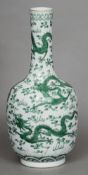 A Chinese famille verte porcelain vase
The elongated neck above the bulbous body, decorated in the
