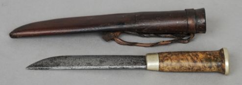 A 19th century maple handled knife, possibly Native American
The blade etched with a buffalo and