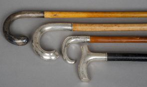 Four Swedish silver mounted walking sticks, various dates and makers, all hallmarked
The largest
