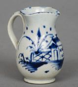 An 18th century miniature blue and white pearlware jug, possibly Caughley 
Decorated in the Oriental