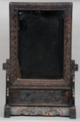 A late 18th/early 19th century Chinese carved hardwood table mirror
The removable mirror plate in