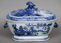 An 18th century Chinese blue and white porcelain tureen and cover
With twin mask handles and