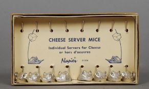 A boxed set of eight Napier cheese server mice
Each modelled with a long tail erect.  The box 15 cms