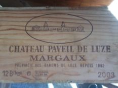 Chateau Paveil de Luze, Margaux 2003
Twelve bottles in old wooden case.  (12)   CONDITION