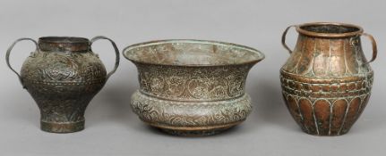 Three early Italian copper vessels
Comprising: bowl with flared rim and two twin handled vases, each
