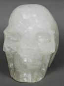 A large rock crystal skull
Naturalistically carved.  32.5 cms long.   CONDITION REPORTS:  Overall