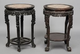 Two late 19th/early 20th century Chinese carved hardwood marble inset side tables
One with a