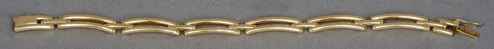 A 14 ct gold bar form bracelet
20 cms long.   CONDITION REPORTS:  Overall good, approximately 23