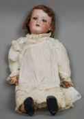 A 19th century Armand Marseille German bisque headed doll, numbered 390 and A7 1/2
Together with