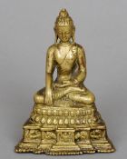 A bronze model of Buddha
Typically modelled seated in the lotus position.  10.5 cms high.