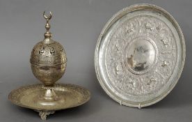 An Indian silver cup and cover on stand
With engraved and pierced foliate decoration; together