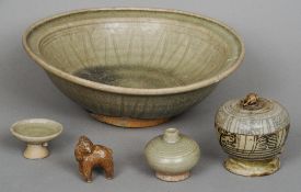 An early Chinese celadon ground bowl, possibly 14th century
Together with three other similarly