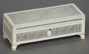 A 19th century pierced ivory box
The hinged rectangular lid and the main body formed from ornately