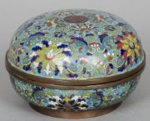 A 19th century Chinese cloisonne box and cover
Of circular form with allover floral scrolling