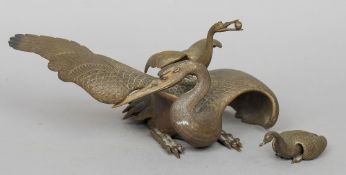 A Japanese Meiji Period bronze model of a crane
The lid also formed as a crane; together with a