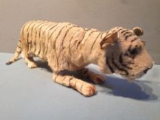 A 19th century French automaton mechanical model of a stalking tiger
With articulated head and limbs