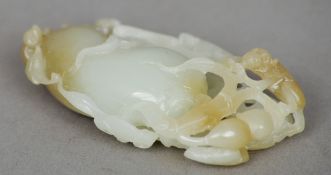 A Chinese carved and pierced jade group
Worked as a mythical beast amongst a fruiting vine.  7 cms