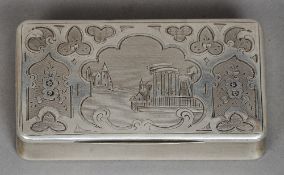 A 19th century Continental silver snuff box
The hinged rectangular top depicting ruins in a