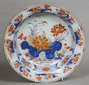 A 19th century Chinese Imari porcelain bowl
Typically decorated with floral sprays on a diaper