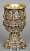 A Jewish white and gilt metal Kiddush cup
Architecturally modelled and inscribed Jerusalem 3000