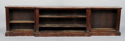 A 19th century rosewood breakfront library dwarf bookcase
The moulded top above three open shelved