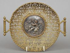 A 19th century Continental brass filigree and silver plated bonbon dish
With twin handles, centred