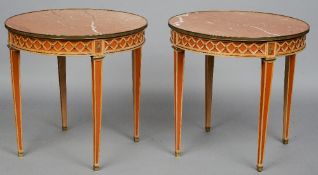 A pair of mid 20th century Russian neo-classical style bouillotte centre tables
Inset with pink