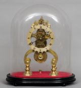 A Victorian brass skeleton clock
Of typical form, the chapter ring with Roman numerals, mounted on