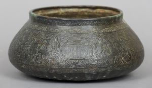 An unusual Middle Eastern bronze bowl, 19th century or earlier
Of squat form, decorated with