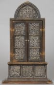 A triptych form portable altar, possibly 17th century, Russian
The white metal panels depicting