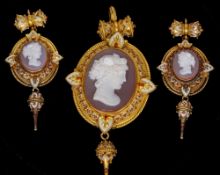A fine quality 19th century unmarked yellow metal cameo set pendant brooch
The stone set oval body