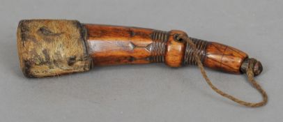 A rare Southern African stained ivory snuff bottle
Of tapering form, one end hide covered.  11.5 cms