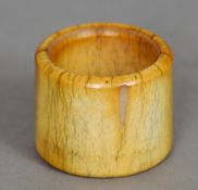 A Chinese ivory archers ring
Of typical form. 3 cms high.   CONDITION REPORTS:  Overall good, some