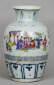 A Chinese porcelain baluster vase
Decorated with figures interspersed with floral sprays within