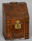 A late 18th/early 19th century leather covered knife box
With gilt tooled decoration, a brass