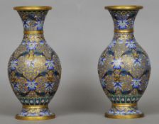 A pair of Chinese gilt metal cloisonne baluster vases
Each extensively worked with lotus strapwork.