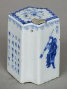A 19th century Chinese blue and white porcelain seal
Decorated with warriors and calligraphy (