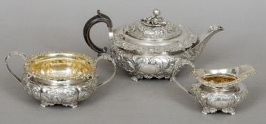 A matched George IV silver three piece tea set, the teapot hallmarked London 1822, maker's mark of