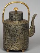 A 19th century yellow metal worked Bidriware coffee pot
With split swing handle, flowerhead finial