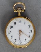 A Continental gold cased pocket watch, case marked 18K
Of small proportions, the white enamel dial
