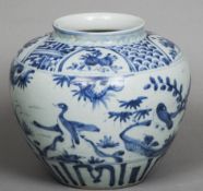 A 19th century Chinese porcelain blue and white vase
Of squat baluster form, the main body decorated