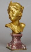 A 19th century French gilt bronze bust
Formed as a young girl wearing a tiara, standing on a waisted
