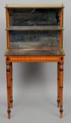 A Victorian inlaid satinwood three tier side table
With faux marble top, the three quarter pierced