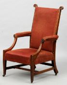 A 19th century mahogany framed Gainsborough chair
The padded back between scrolling curved