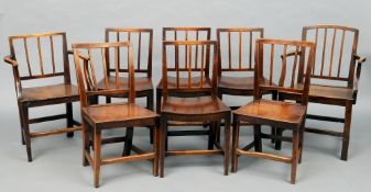 A matched set of eight 19th century elm and fruitwood country dining chairs, including a pair of