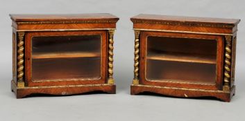 A pair of 19th century gilt decorated kingwood dwarf pier cabinets
Each rectangular top above a