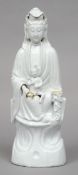 An 18th century Chinese porcelain blanc de chine figure of Guanyin and child
Typically modelled.